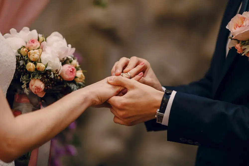 Couples wearing rings to each other.